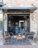 Garage Doors Open to patio.